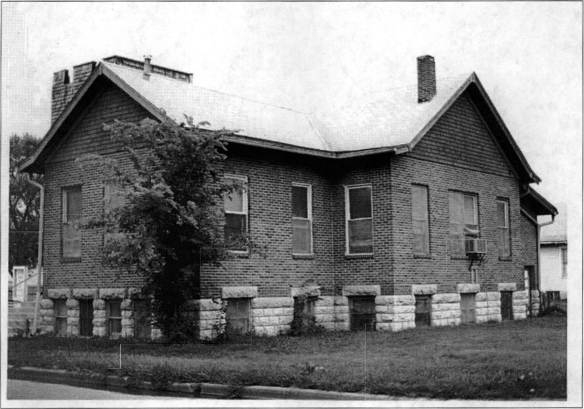 view of one story brick church building