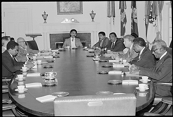 Jimmy Carter and Congressional Black Caucus members around a large table