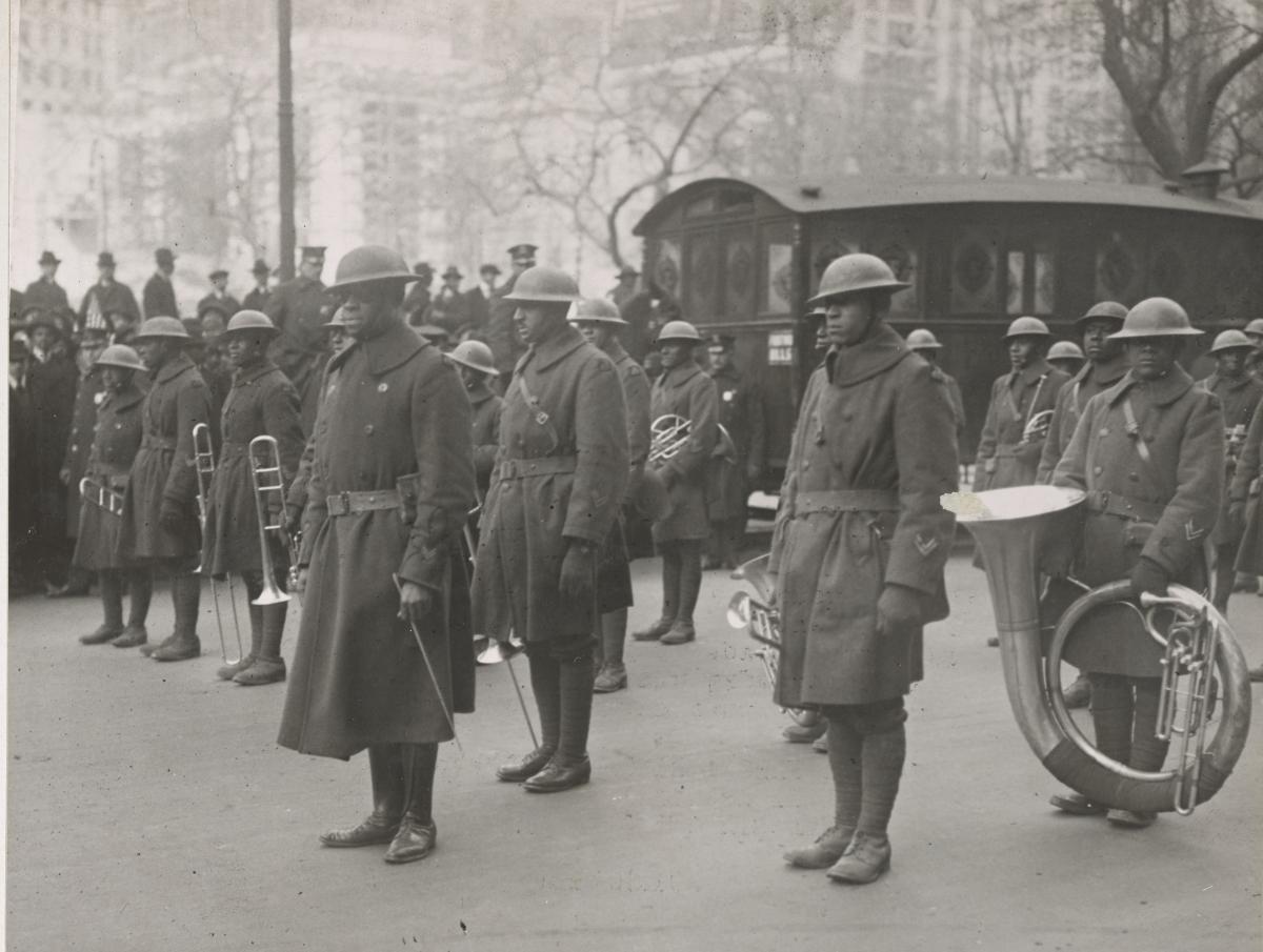military musicians with their instruments standing in a parade
