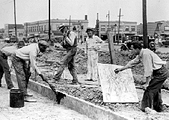 Michigan artist Alfred Castagne sketching WPA construction workers, May 19, 1939 (National Archives, Records of the Work Projects Administration, 69-AG-410)