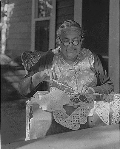 A Mission Woman making lace