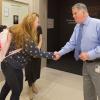 Archivist of the United States David S. Ferriero greets Caitlyn Merrell of Rifle, Colorado, during her recent trek across the country to see her uncle’s memorabilia in the National Archives’ “Remembering Vietnam” exhibit. (National Archives photo by Jeffr