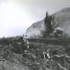 A Japanese position at the base of Mount Suribachi is eliminated by a high explosive charge set off by the invading Marines.