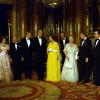 President Carter meets Queen Elizabeth at a Buckingham Palace dinner for the G7 Summit