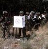 Soldiers vote in a field