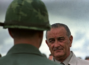 Photograph of President Lyndon Johnson Visiting with U.S. Troops in Cam Ranh Bay, Vietnam