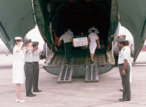 US military personnel salute